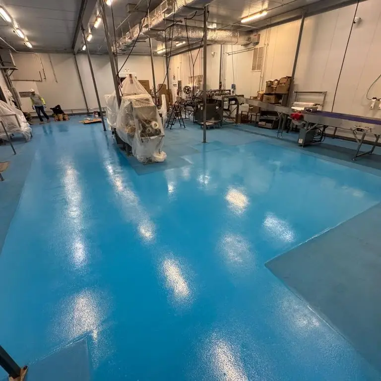 Industrial epoxy floor coating installation for a Paterson NJ food processor.