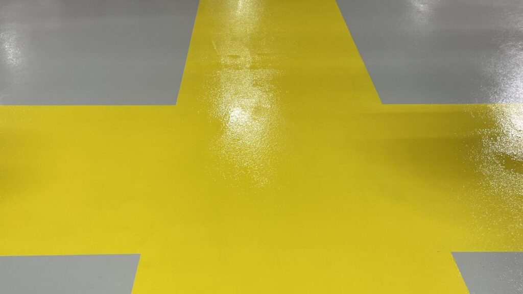 High-durability industrial epoxy flooring for a Jersey City, NJ logistics and moving facility.