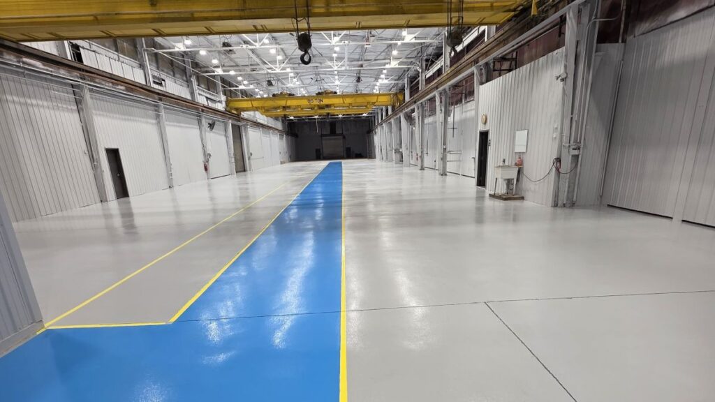 High-gloss industrial epoxy flooring with a hard chrome finish was installed in a Newark manufacturer's facility.