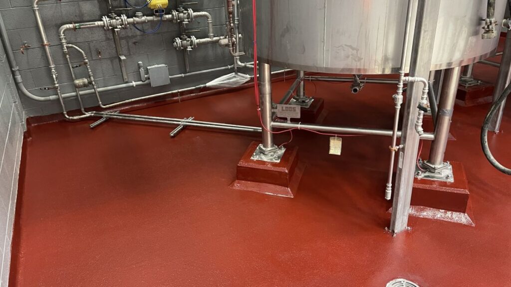 Chemical-resistant industrial epoxy flooring for a specialized manufacturing facility in Rahway, NJ.