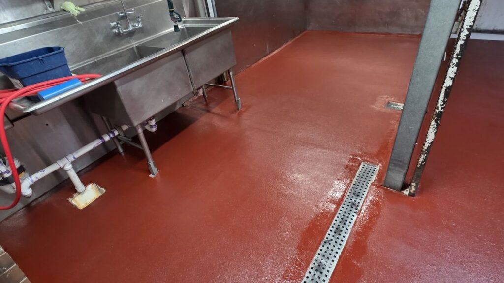 Commercial kitchen epoxy flooring installed for a food processing facility in Paterson, NJ.