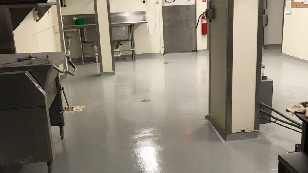 Commercial kitchen flooring installation in Bloomfield, NJ featuring seamless, slip-resistant epoxy surfaces.