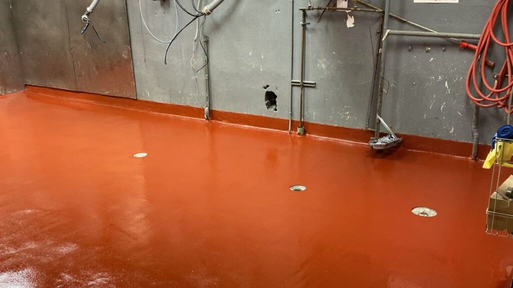 Heavy-duty antimicrobial restaurant epoxy flooring with integrated cove base in Mount Laurel, NJ.